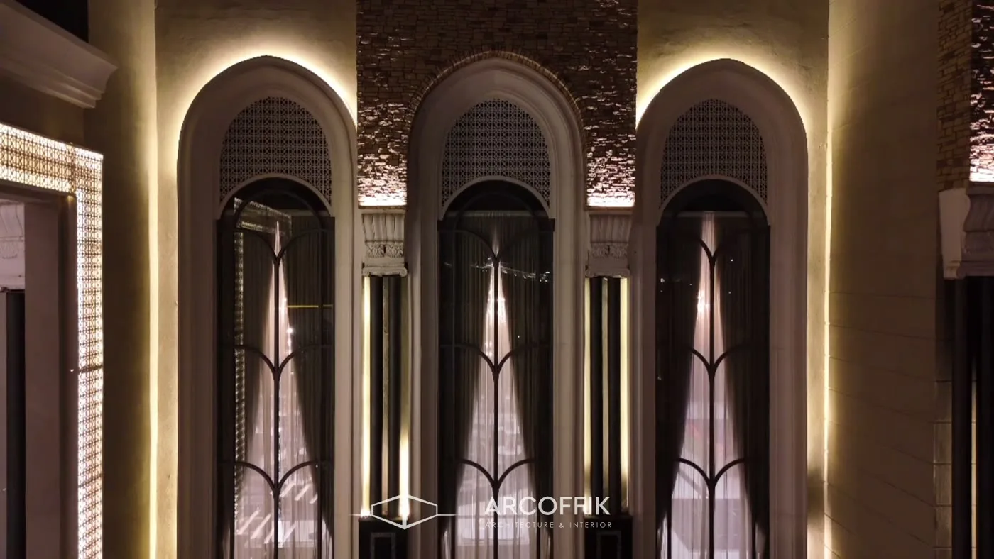 Decorative arches and illuminated architectural details inside Riviera