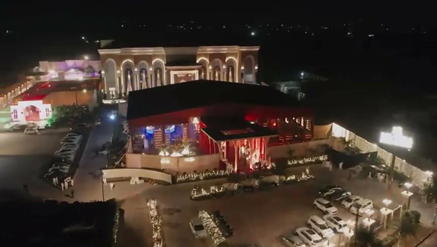An aerial view of Riviera Resort illuminated at night